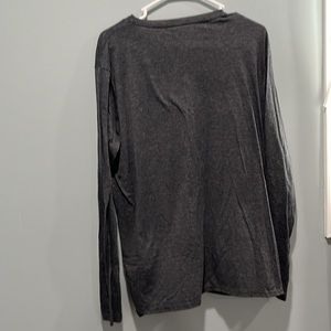 Gray long sleeved shit